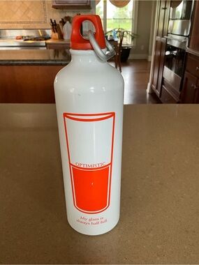 Optimistic White Water Bottle with Orange Accents
